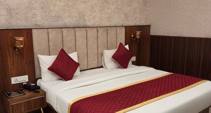 Palm Residency Room Type - Deluxe Room with Air Conditioning