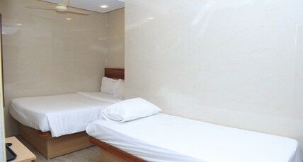 TCS RESIDENCY Room Type - Premium Triple Bed AC