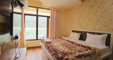 Ganga Forest View| Rooms in a Homestay Room Type - LUXURY ROOM WITH LAKE VIEW