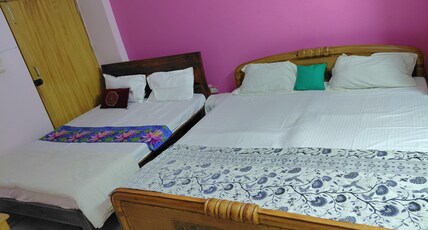 Nilayam guest house Room Type - Quadruple Room with private bathroom