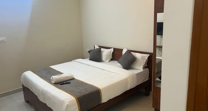 Hotel orchid suites Room Type - Deluxe Room AC
