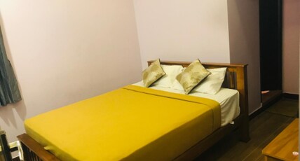 PADMA RESIDENCY Room Type - Deluxe Room