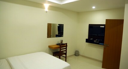 Palm Residency Calicut Room Type - Standard Double Room Non AC Palm Residency Calicut Room Type - Standard Double Room Non AC
