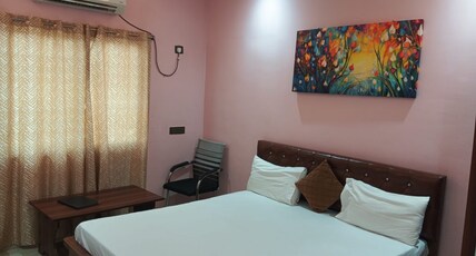RAJ RESIDENCY Room Type - Deluxe Room