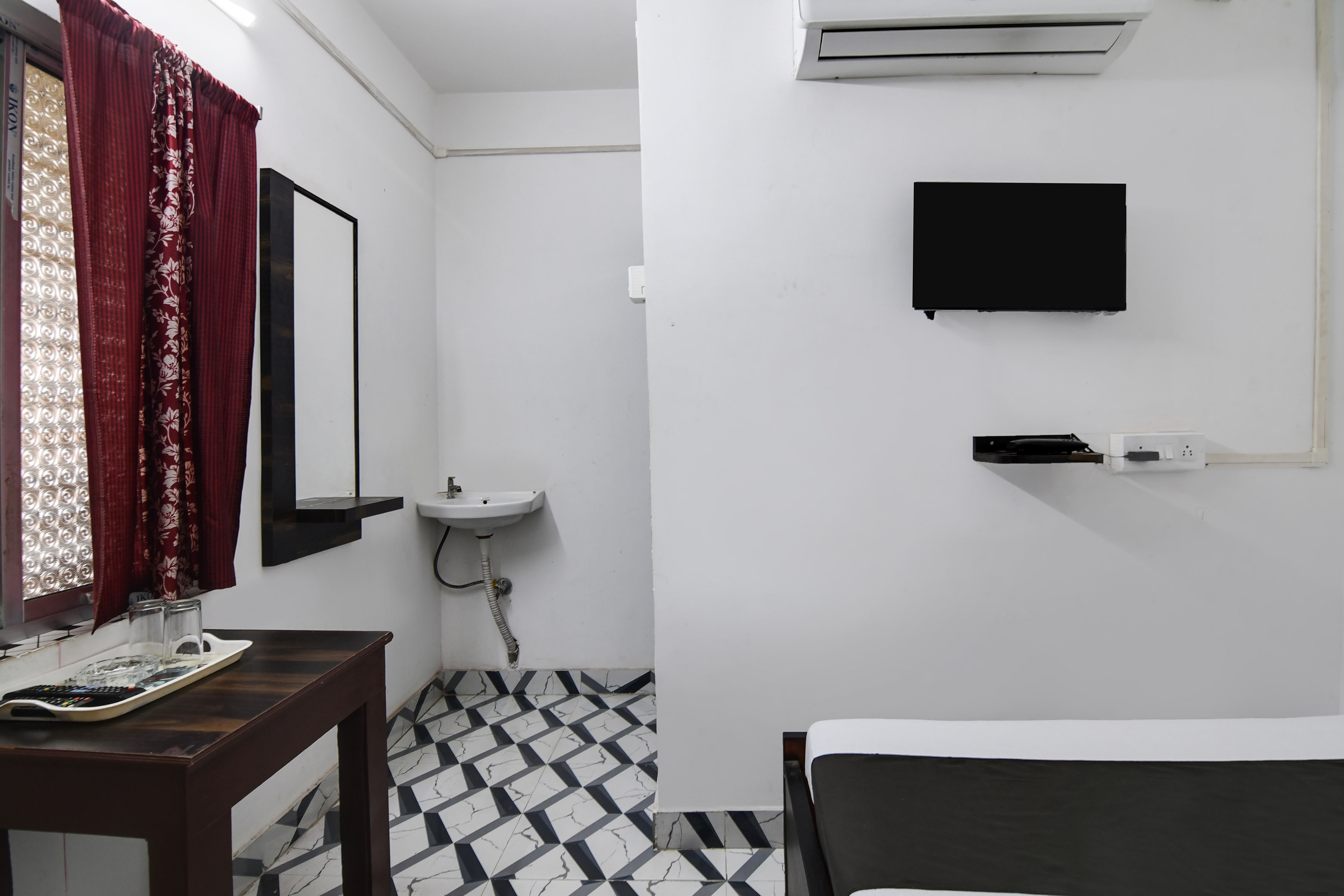 Hotel O PPS NEST Guest House - Tap to explore photos