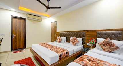 Hotel Le grand Roof Top restaurant -Walk -in  from Rk Ashram  metro Station Room Type - Family Suite Room with Smart TV