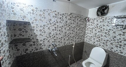PANMOZHI RESIDENCY Room Type - Deluxe Room AC