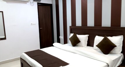 Vinayak Hotel Room Type - DELUX