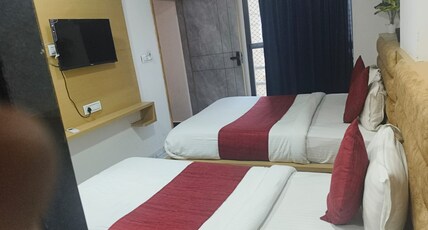 HOTEL SANGAM Room Type - Triple bed room