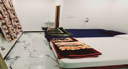 Minnal Residency Thirunallar Room Type - Quadruple Room