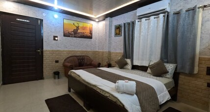 Corbett aroma homestay and restaurant Room Type - Bedroom 104