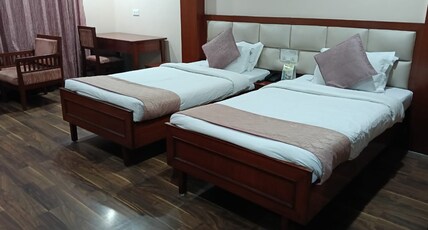 Hotel Sujata( A Unit of Hotel Niranjana Pvt.Ltd) Room Type - Twin Deluxe Hotel Sujata( A Unit of Hotel Niranjana Pvt.Ltd) Room Type - Twin Deluxe