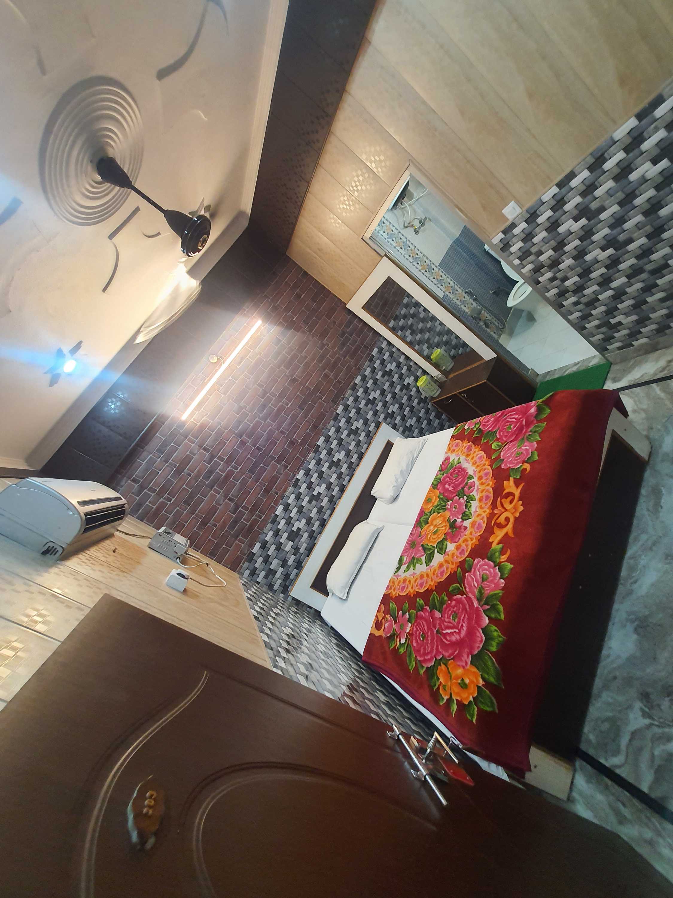 Hotel O Trimurti Guest House - Tap to explore photos