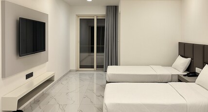 SHREE DATTA RESIDENCY Room Type - TWIN BED SHARING