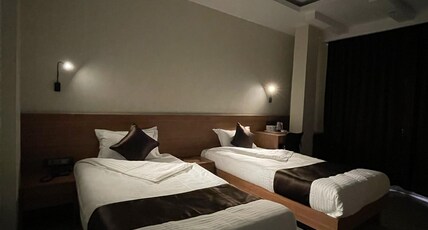 HOTEL MOMON Room Type - Deluxe Twin Bed