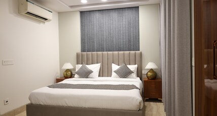 Auraa Suites Room Type - Deluxe Room