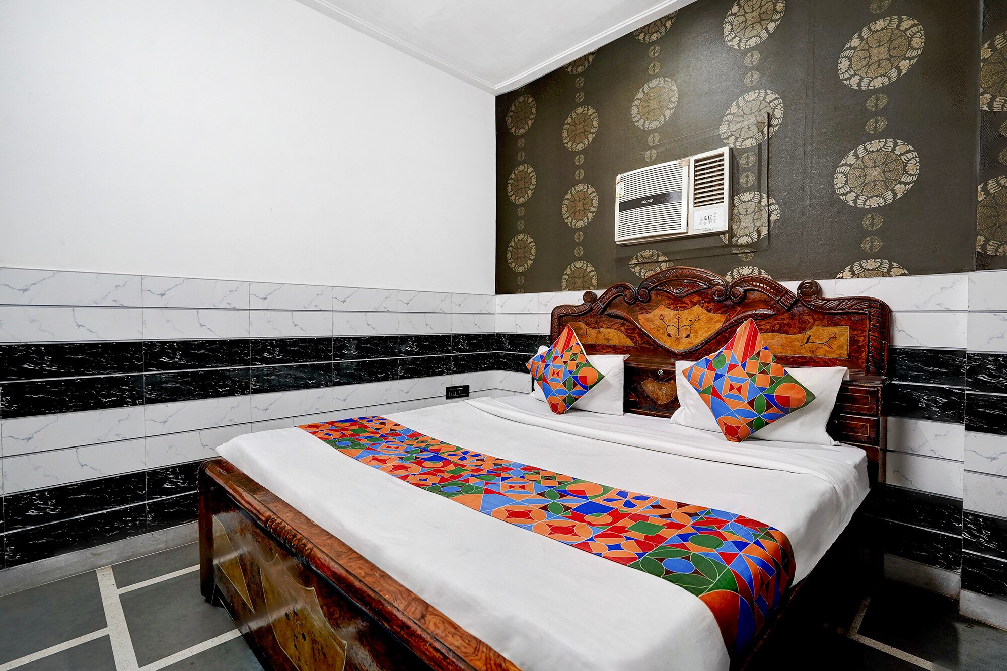 FabHotel Happy Stay I - Tap to explore photos
