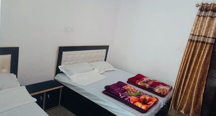 Trishool inn residency Room Type - Triple bed room