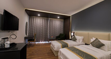 The Khar (Pure Veg | Centrally Heated & Air-Conditioned) Room Type - Executive Rooms with Balcony Mountain view The Khar (Pure Veg | Centrally Heated & Air-Conditioned) Room Type - Executive Rooms with Balcony Mountain view
