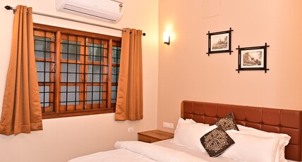 Shridham Homestay Room Type - 102 Deluxe AC Double Bedroom with Attached Private Bathroom