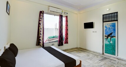 Hotel O Akhil Resort Room Type - Classic