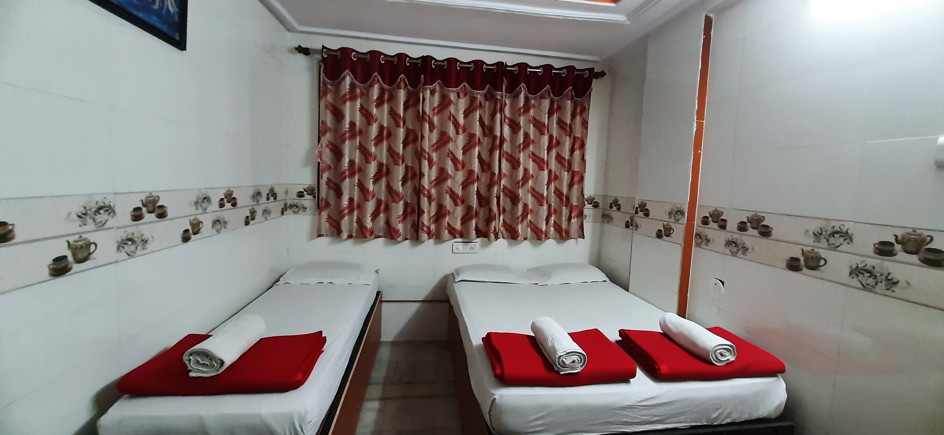 Hotel Sai Laxmi - Tap to explore photos