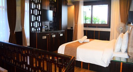 Amba Regency Room Type - Mountain View Family Room (Garden Suite) with Terrace and Couch
