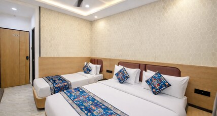 Hotel Matrushree - Near Shree Dwarkadhish Temple Room Type - Family Room ( Triple Bed )