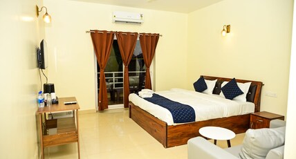 Navratna Guest house Room Type - Deluxe Room