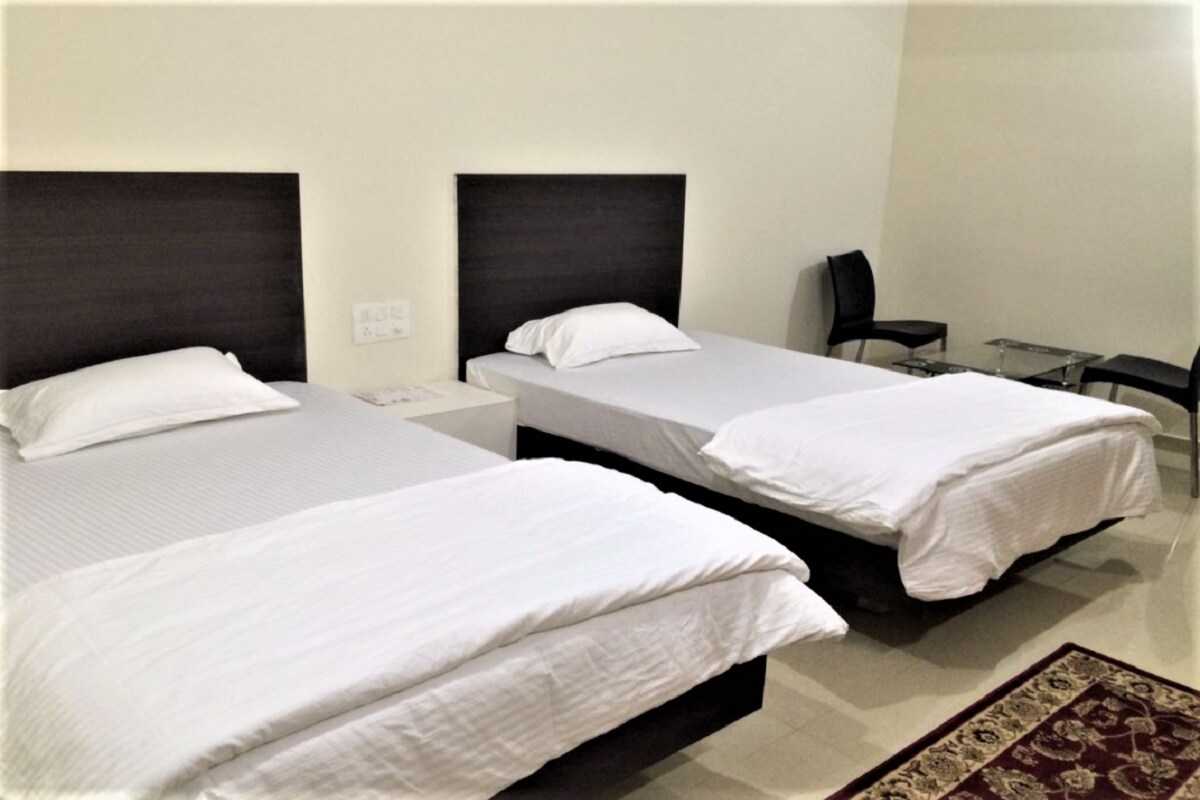 Abhiman Residency - Tap to explore photos