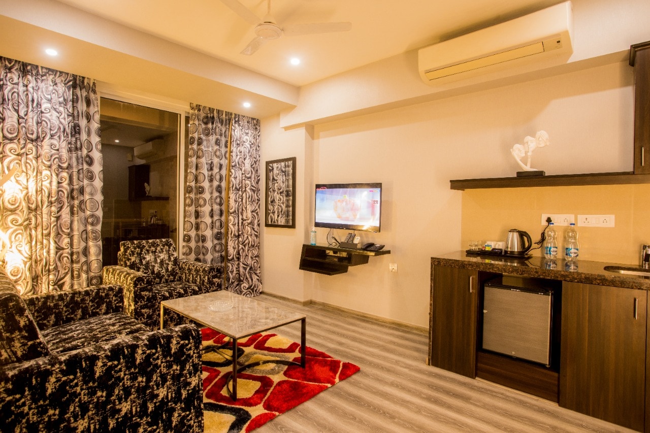 Encore Suites - Tap to explore photos