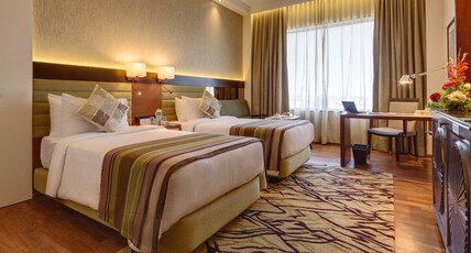 Balaji Sarovar Premiere Room Type - Deluxe Room - Twin Bed Pool View