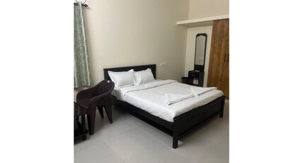 SUBAM RESIDENCY Room Type - Deluxe Room