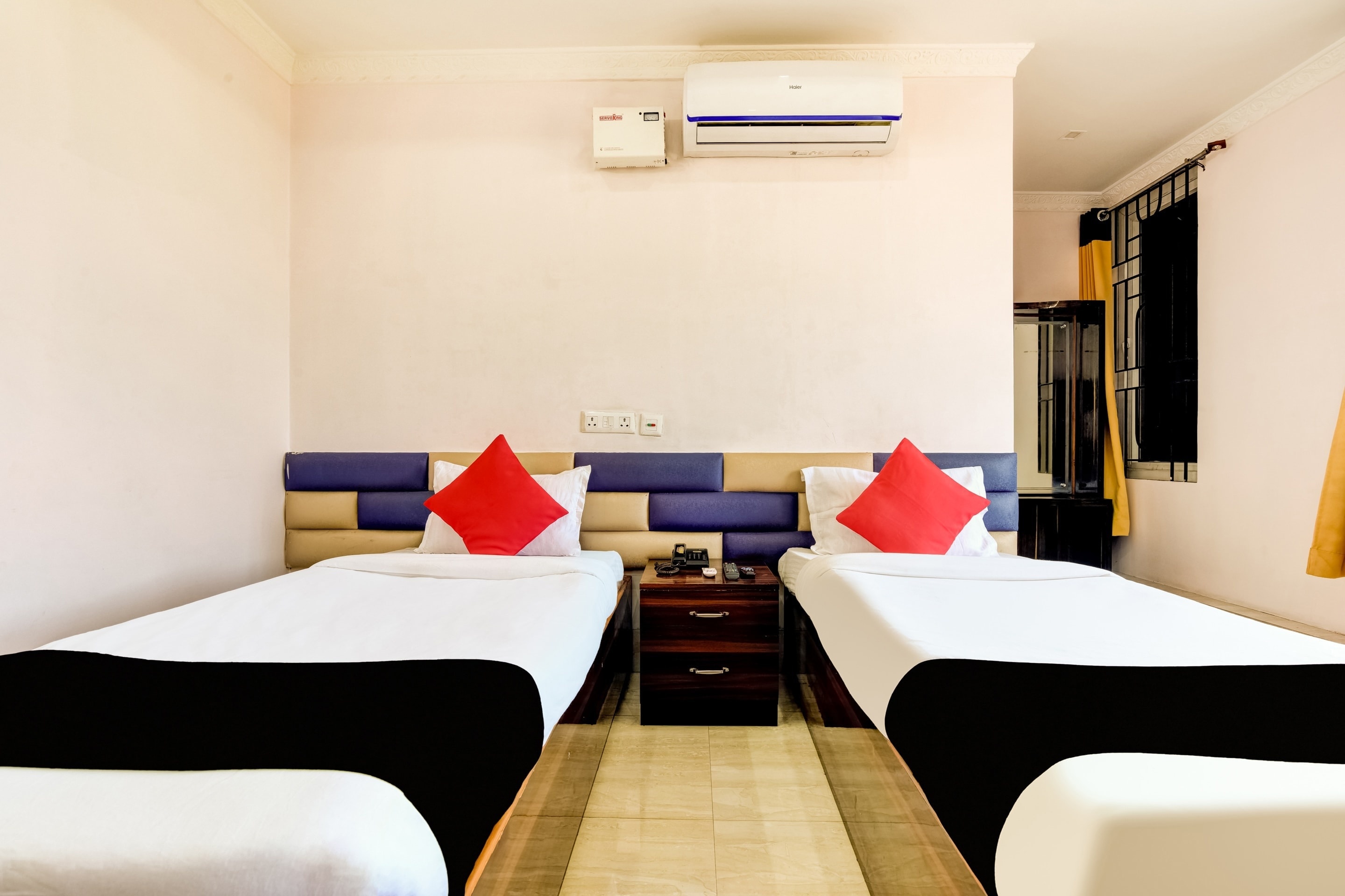 Capital O Good Luck Residency Hotel - Tap to explore photos