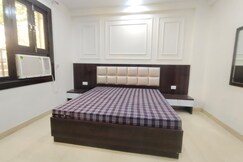 Rooms of Jeet Residency by Twamev