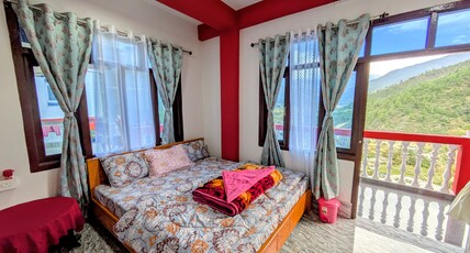 Vista Valley view homestay Room Type - Double bed deluxe room with balcony