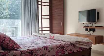Serene Villa 36 Suites and Apartments Room Type - Amber Suite | Garden-Facing Balcony | AC | Walk in Dressing Room