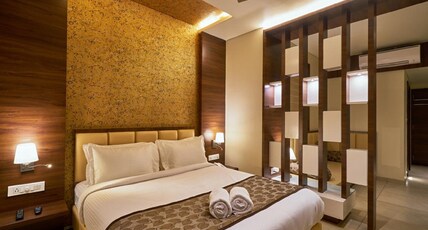 Hotel Shlok (Pure Veg) Room Type - Deluxe AC Room