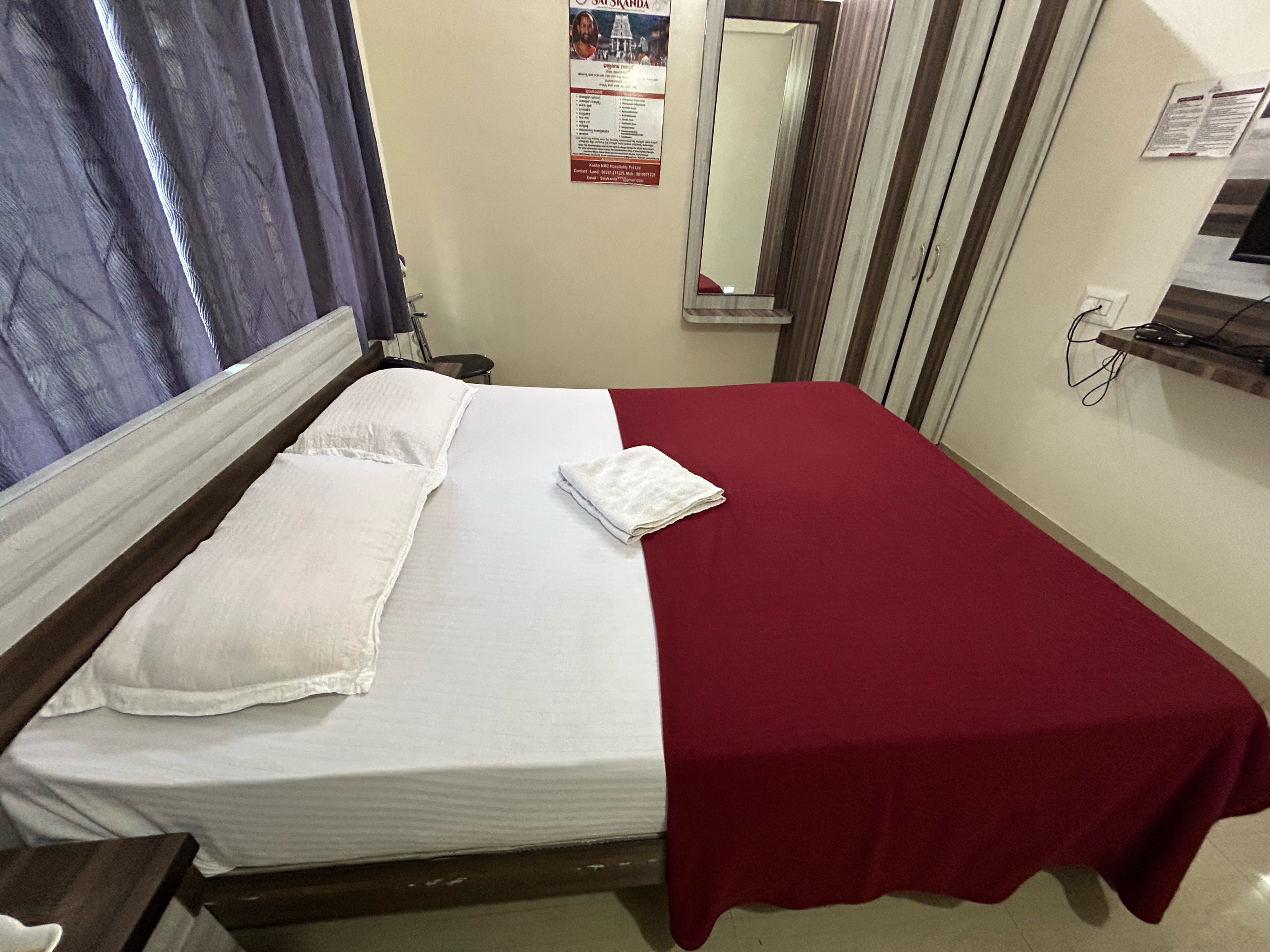 Hotel Sai Skanda - Tap to explore photos