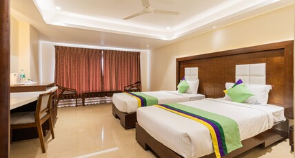 Treebo Suvarna Comforts Room Type - Standard Room