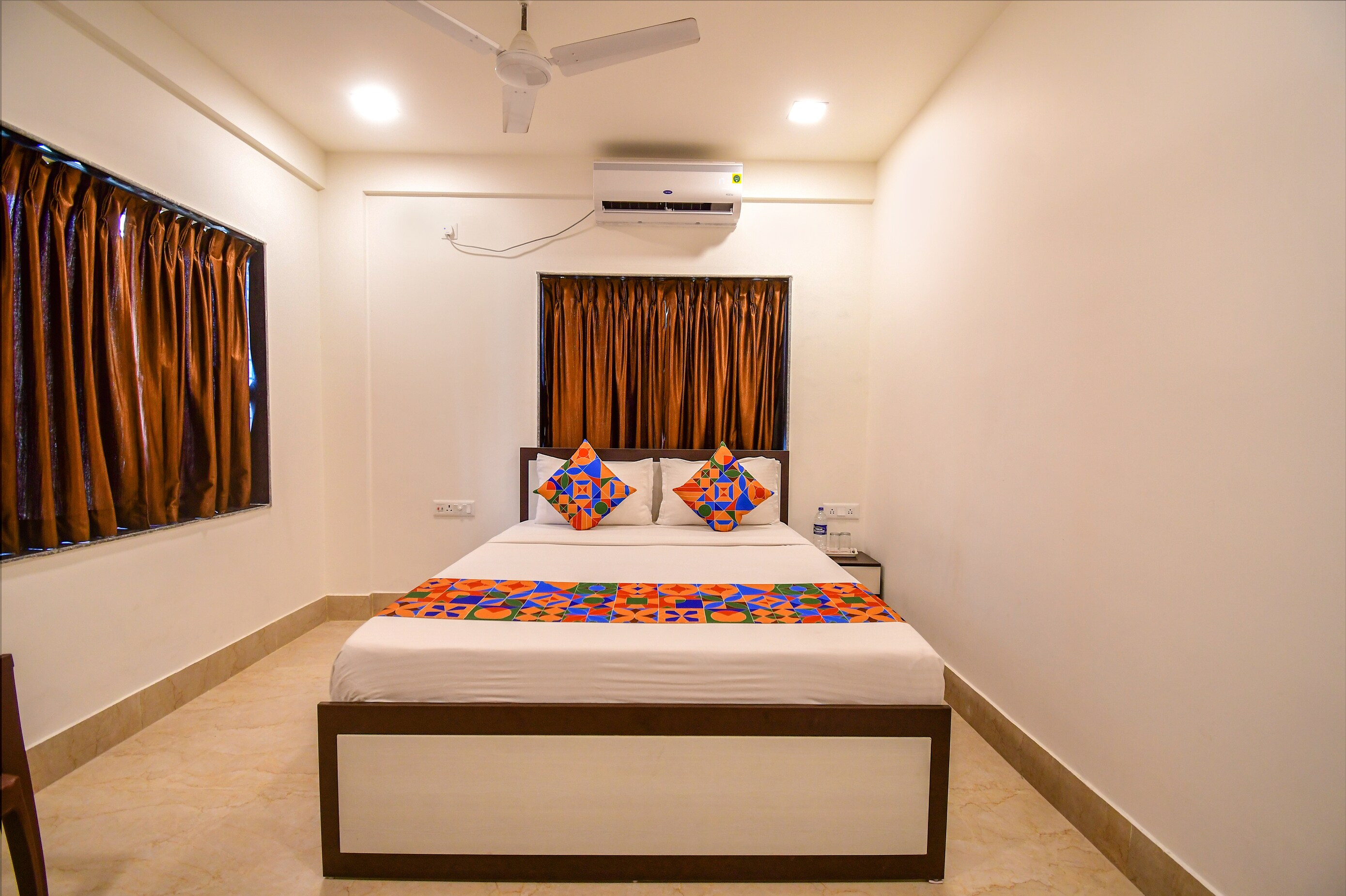 FabHotel Moubani Residency - Tap to explore photos