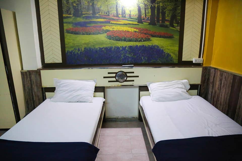 Hotel Happy Home Colaba - Tap to explore photos