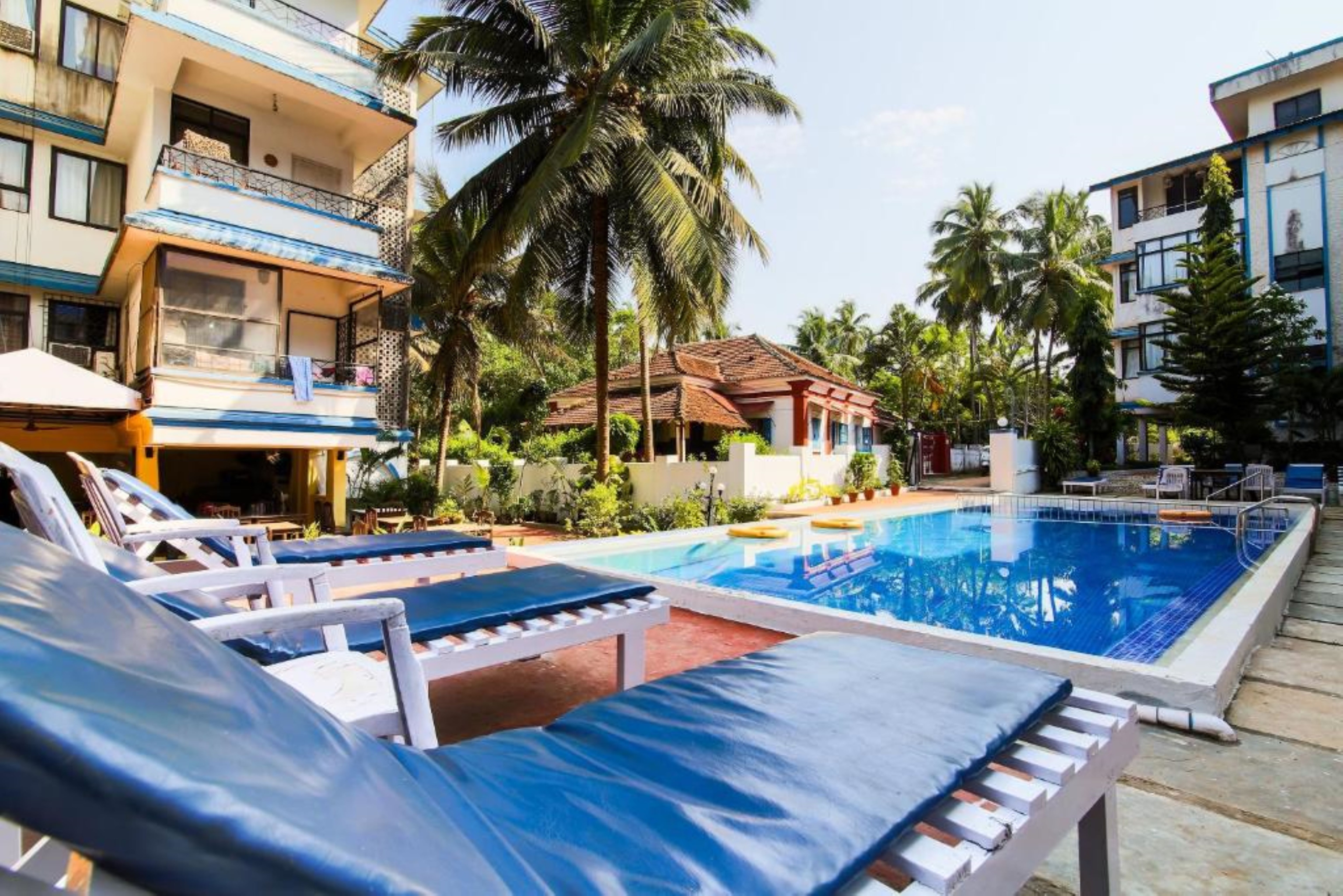Sunpark | 6 Mins walk to Baga Beach | Resort-Style Pool & Apartments - Tap to explore photos