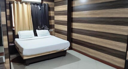 Gujarat Inn Room Type - Deluxe Room