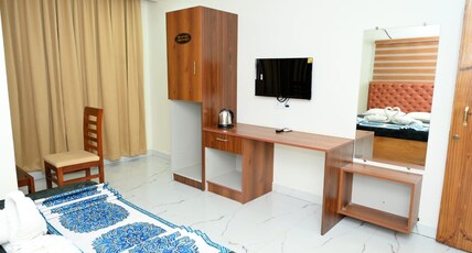 Om residency Room Type - Double Deluxe Non Ac