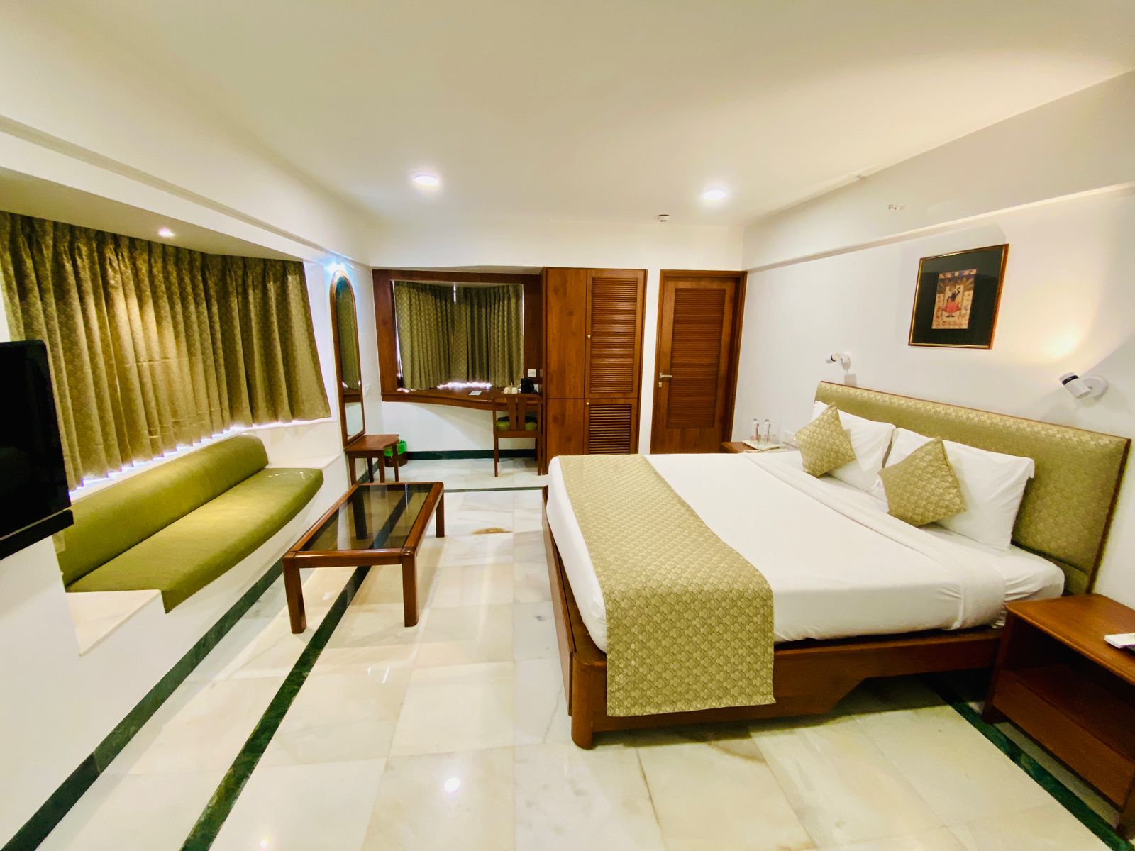 Hotel Parle International - Tap to explore photos