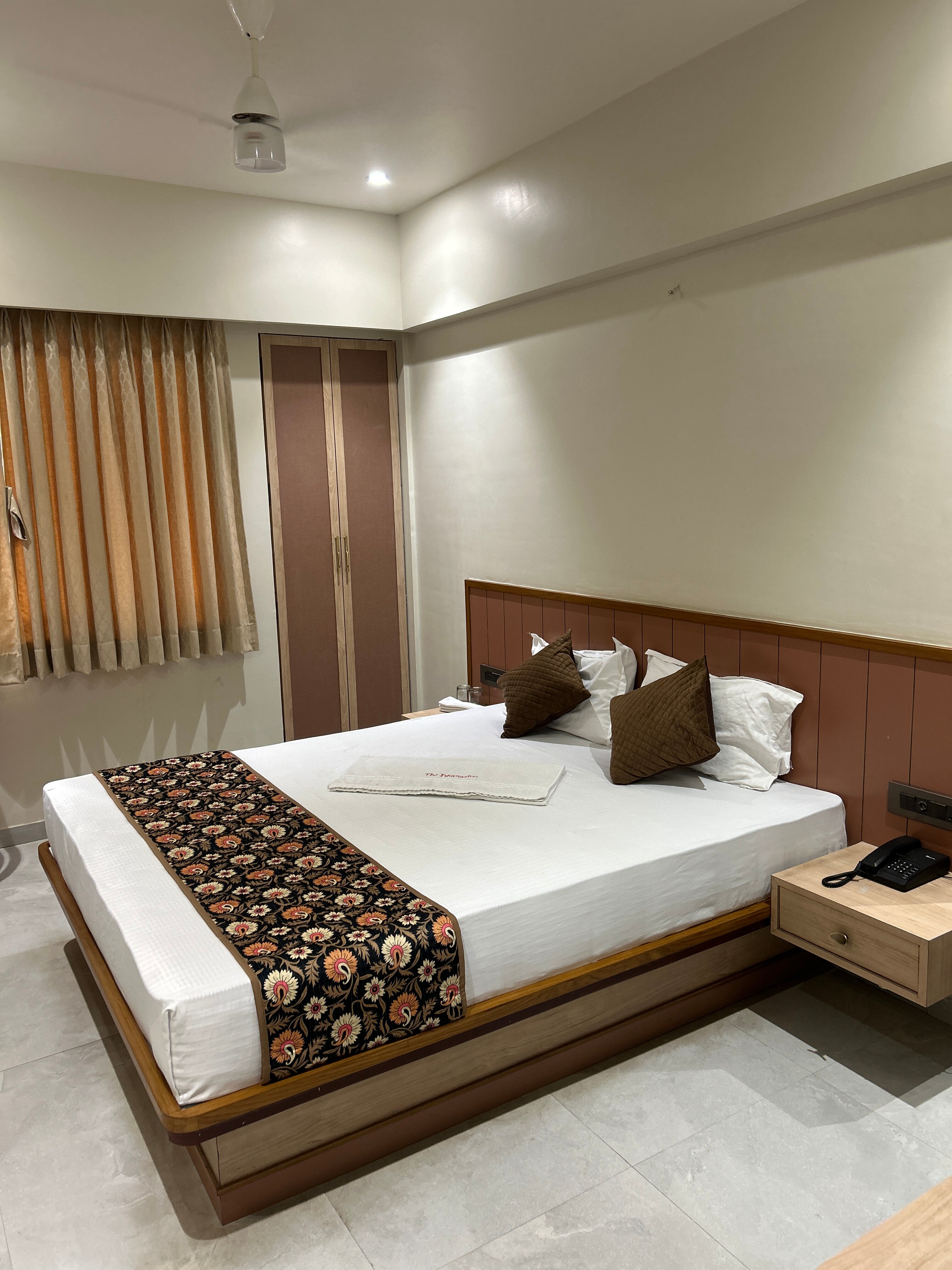 Hotel Dhanashri - Tap to explore photos