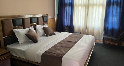 SPITI MONK Room Type - Deluxe Room with Hill View King Bed
