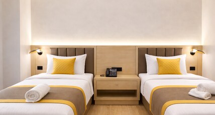 Hotel Mid Town (2 min to walk MG Marg) Room Type - Comfort Room with twin beds