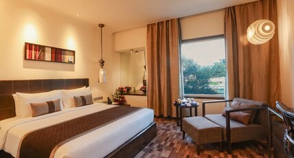 Pride Premier Pune Room Type - Deluxe King  Room